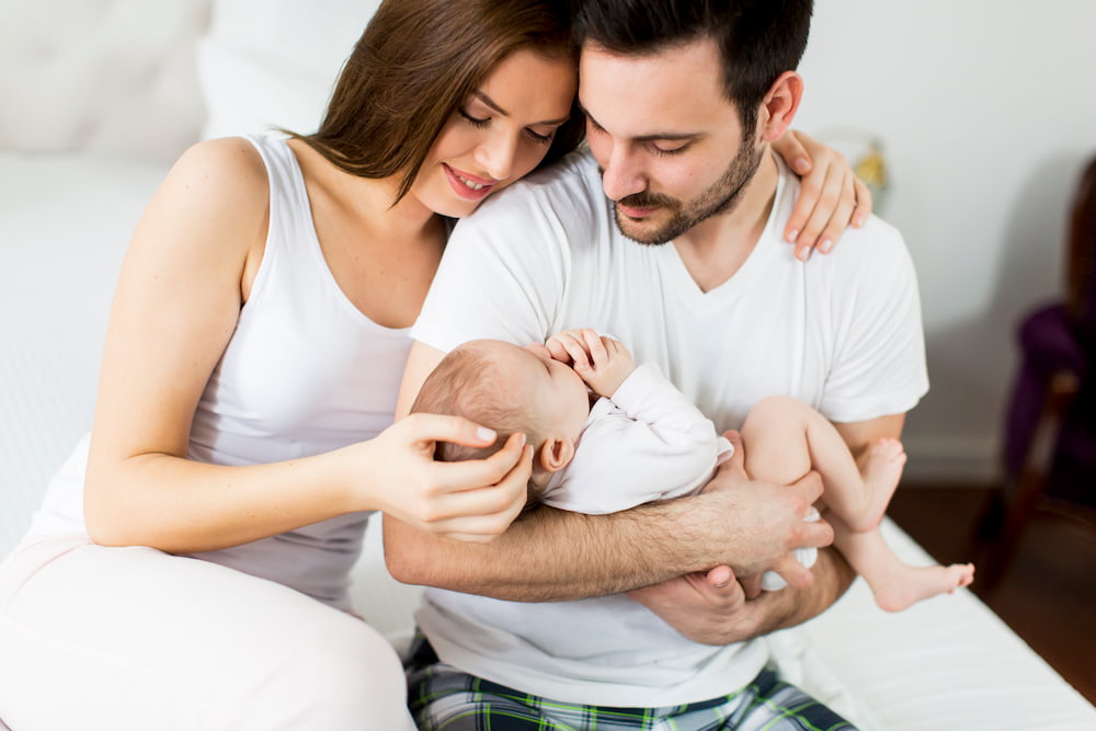 happy family with newborn baby 2023 11 27 05 31 02 utc